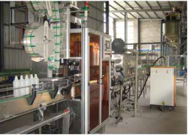 Водонепроникна машина для наклейки термоусадочної гільзи для ПВХ та ПЕТ пляшок