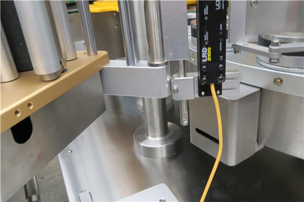 Високошвидкісна ротаційна наклейочна машина для наклейки з фасувальним обладнанням, поясом