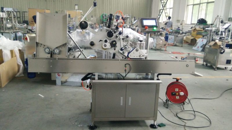 Китайська високошвидкісна маленька кругла банка, клейка машина, машина для наклейок етикеток для чорних пляшок для постачальників косметики